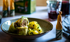 Kale Roulade With Minced Meat Filling, Potatoes, and Underberg Cream Sauce