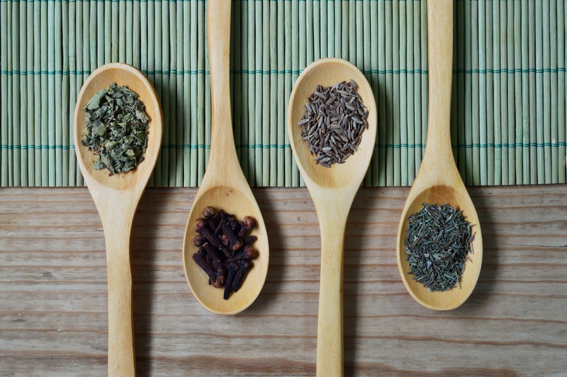 herbal bitters in spoons